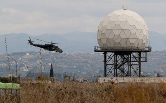 A helicopter flies near a